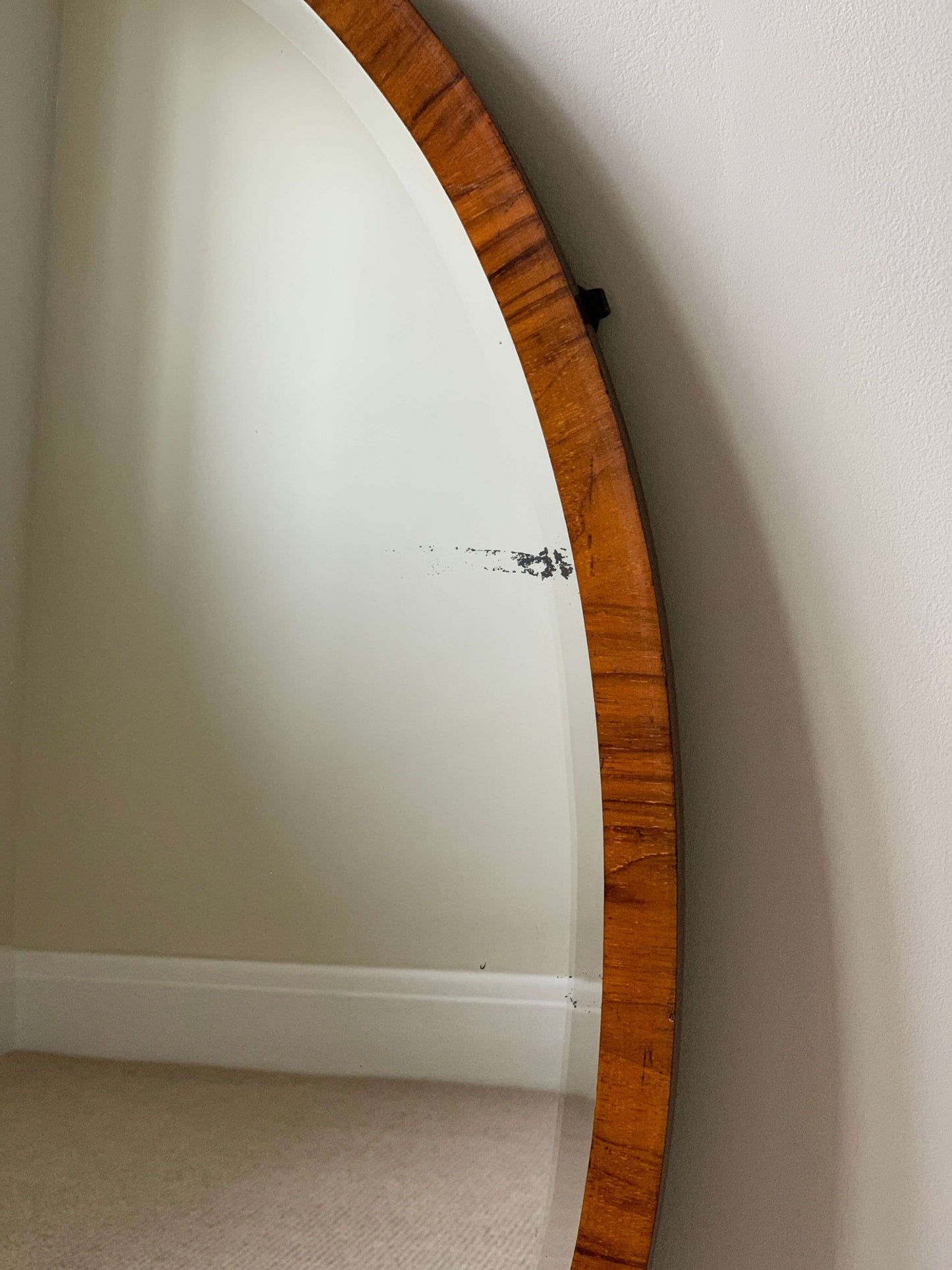 Antique oval walnut veneered mirror