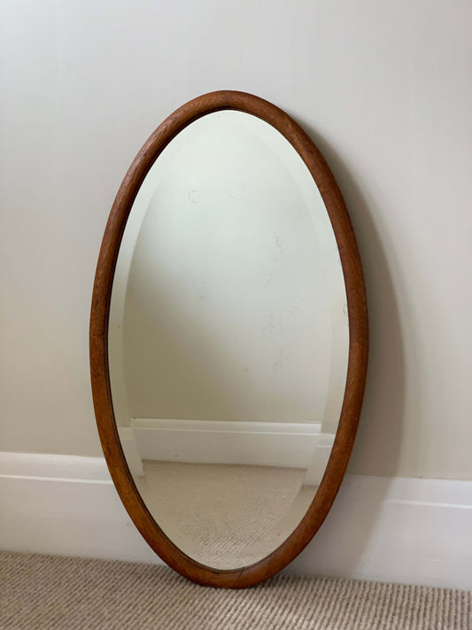 Antique light oak oval mirror