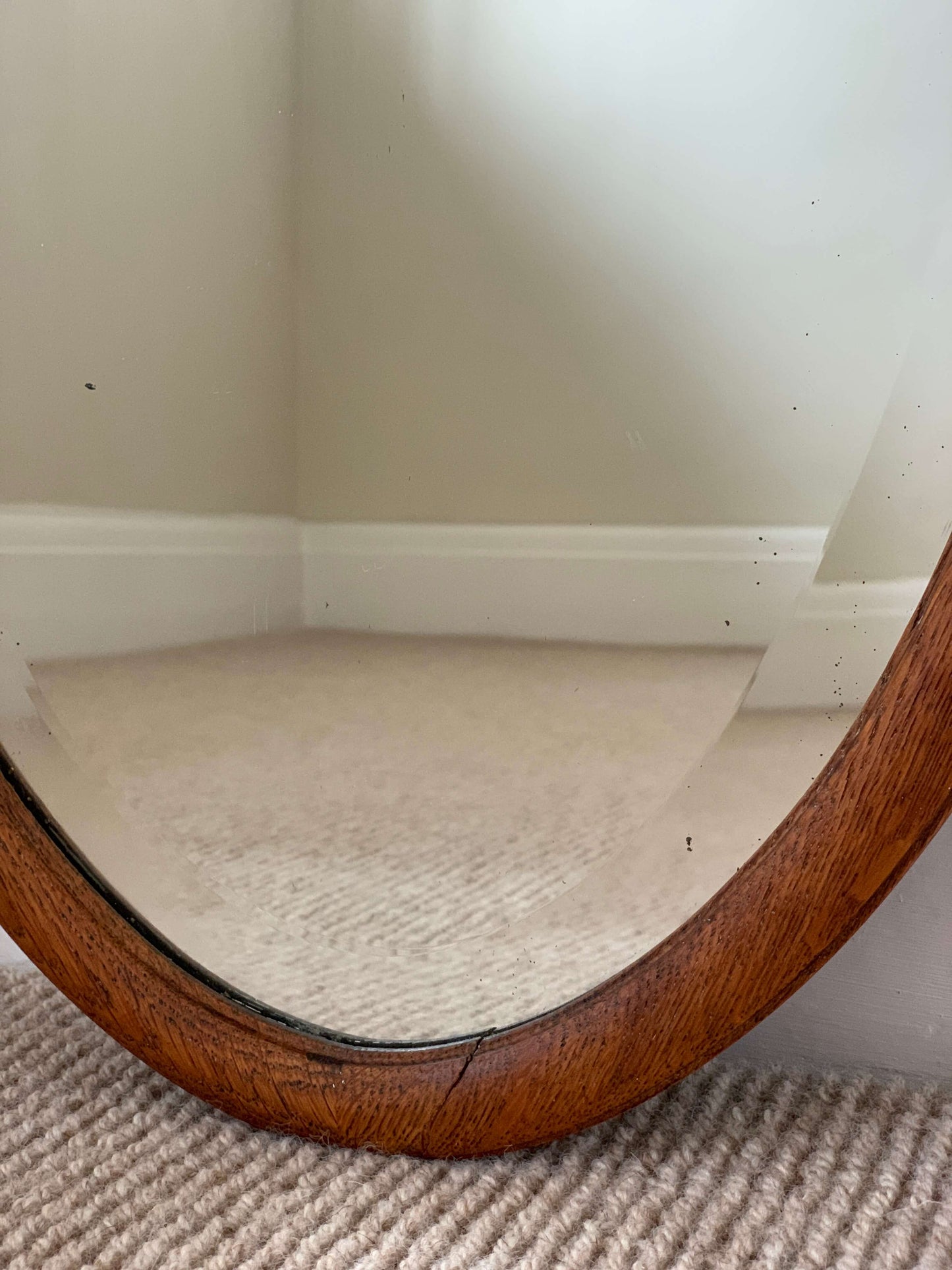 Antique light oak oval mirror