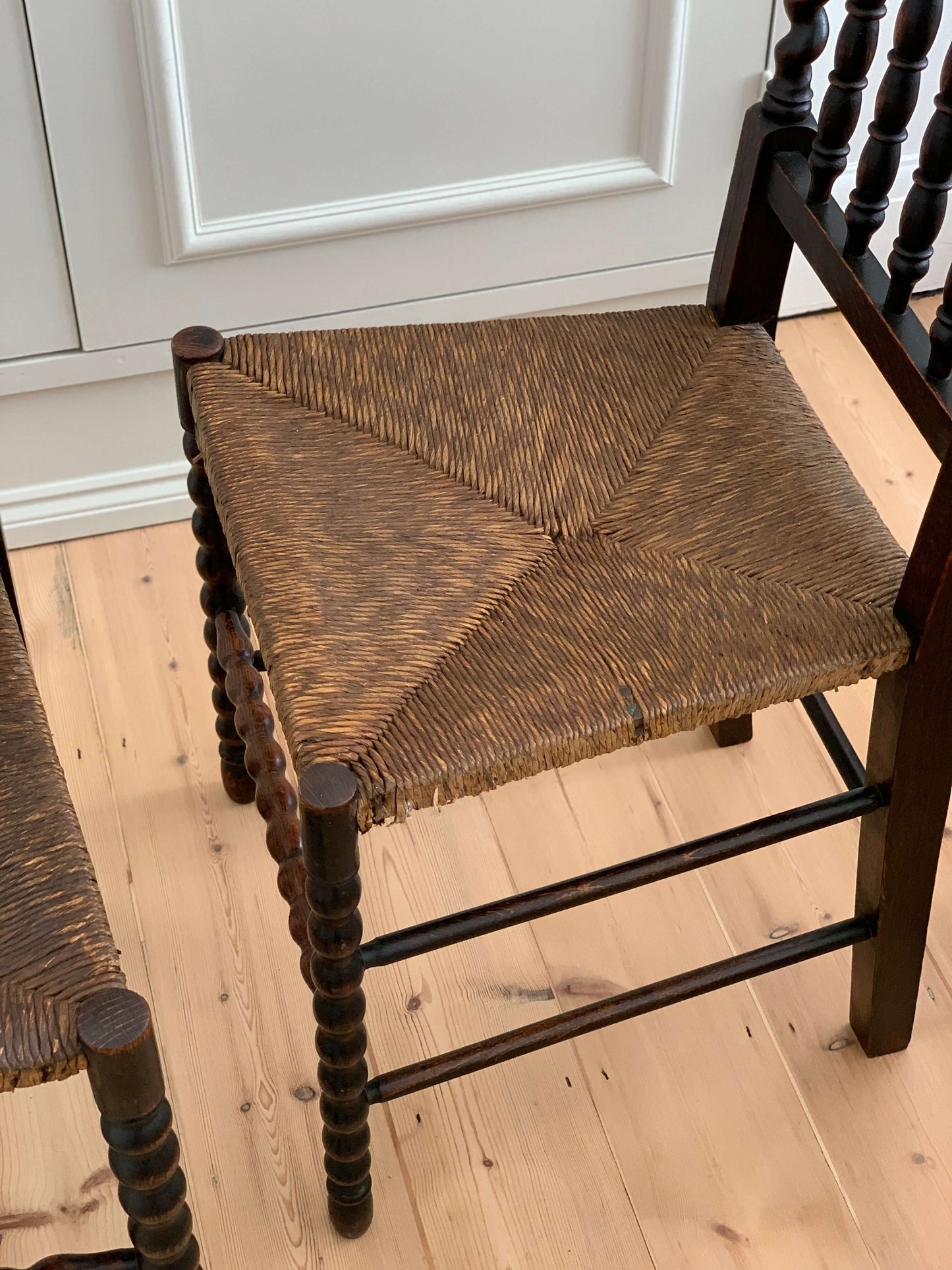 Pair of French antique rush bobbin chairs