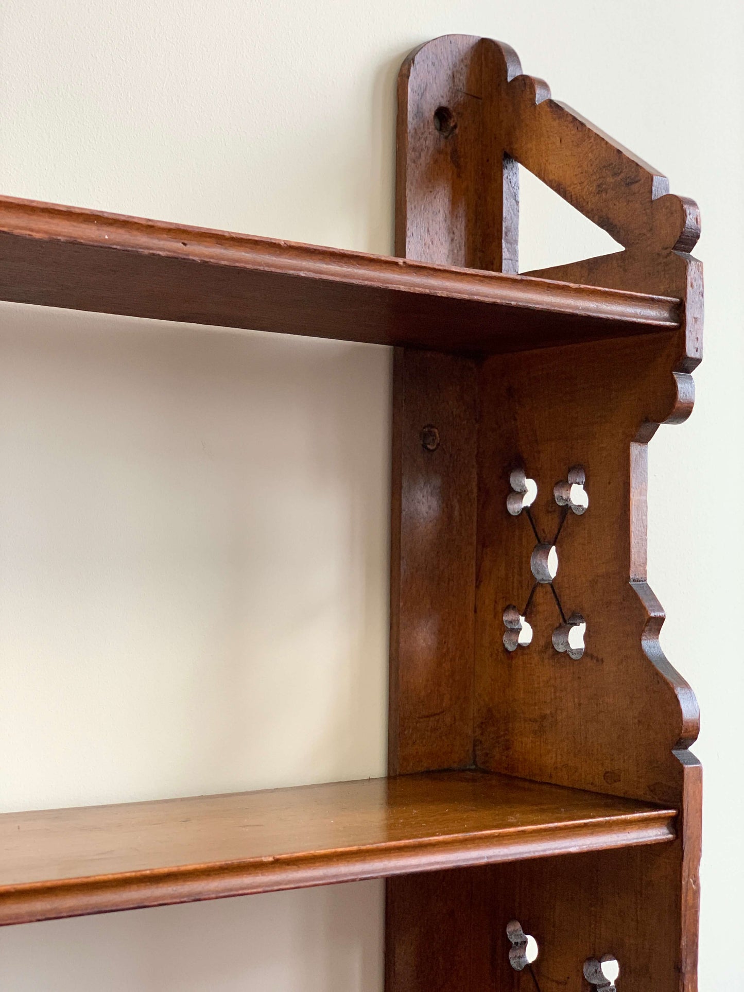 Antique shelf with scalloped detail