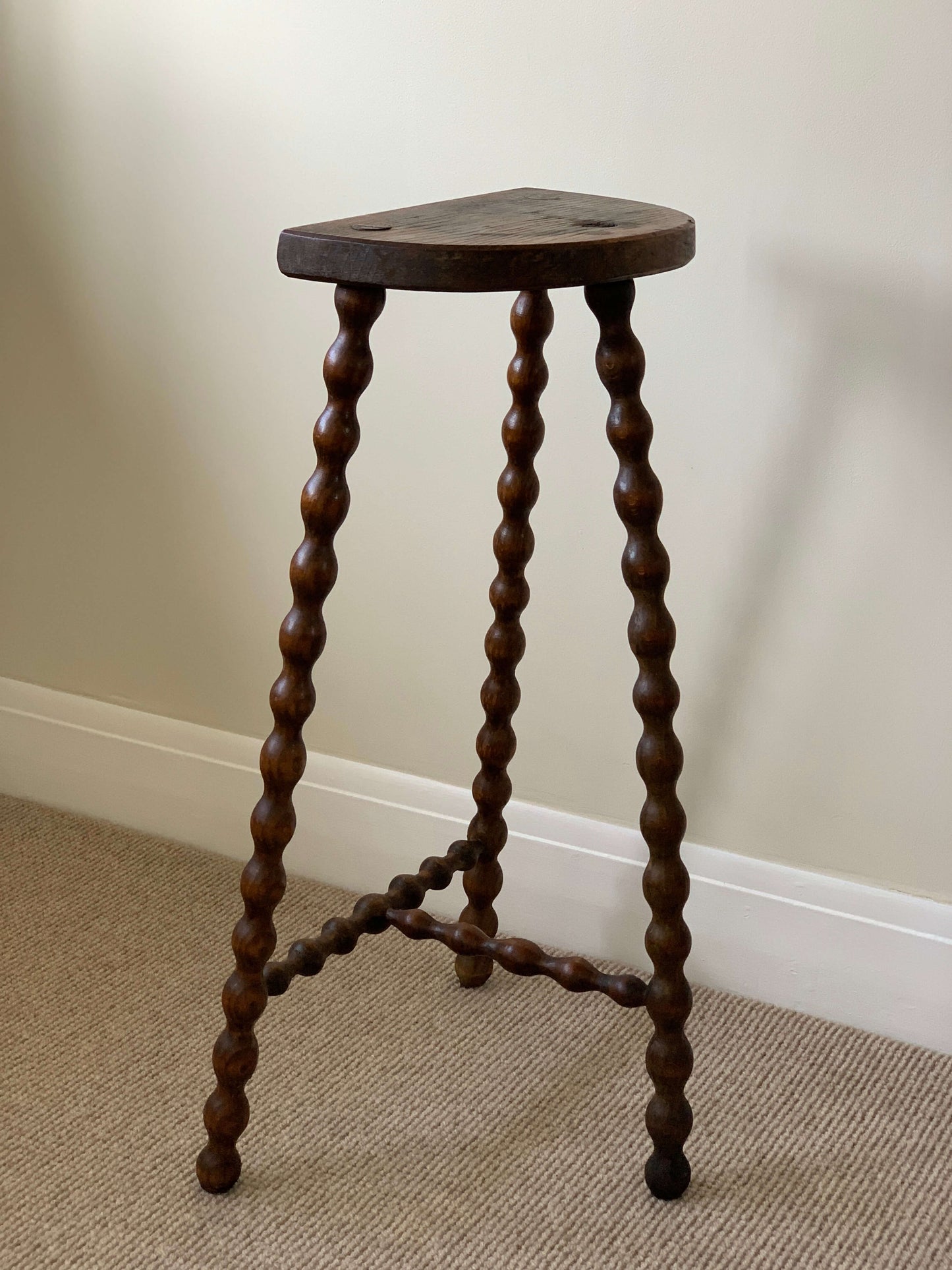 French antique tall demilune bobbin stool