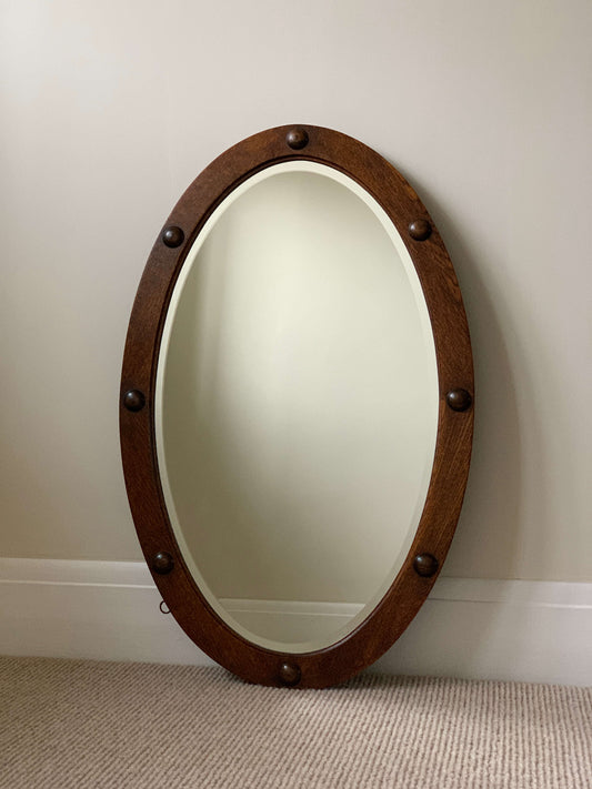 ON HOLD Antique oval mirror with circular details